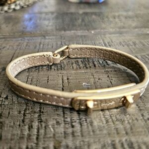 Coach Bracelet. Brass hardware with horse and carriage logo etched.